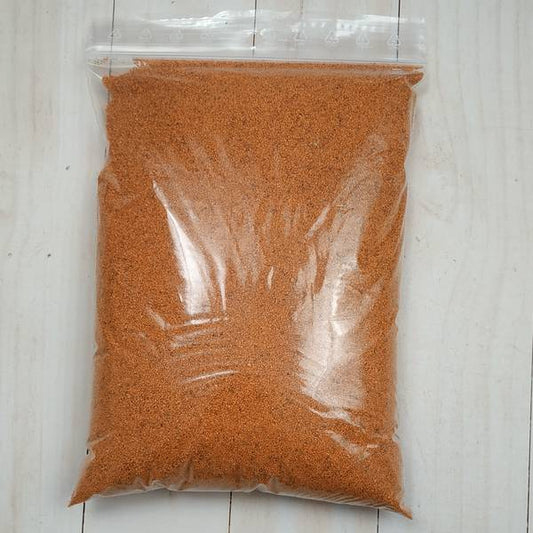 Dekorhomok narancssárga kvarchomok, szemcseméret 0,4-0,8 mm, 30 g.
