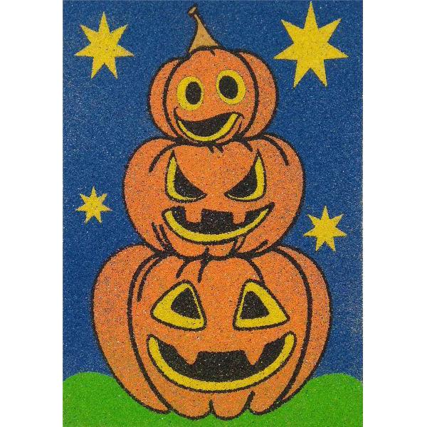 Halloween-themed sand art kit with pumpkin design and stars.